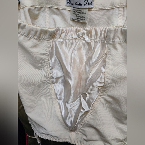 Elegant Cream Women's Intimate Wear girdle with garter straps.